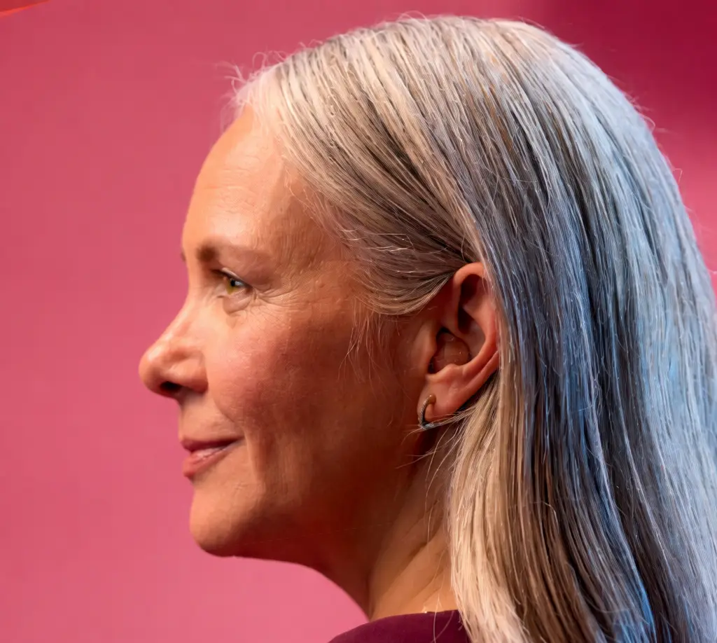 Lady wearing a Discreet ITE hearing aid